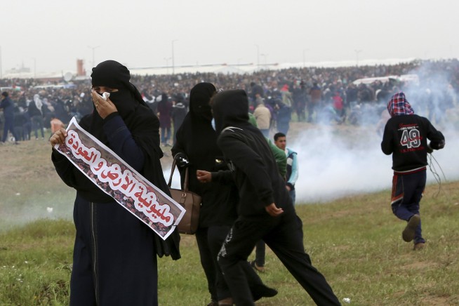 Thousands rally in Gaza but Hamas mostly restrains crowds