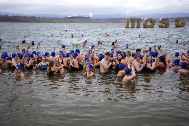 Cold-water swimmers in the Czech Republic set a new world record for the largest polar bear dip