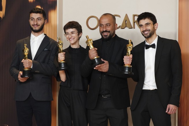Oscar-winning Palestinian director is attacked by Israeli settlers and detained by the army