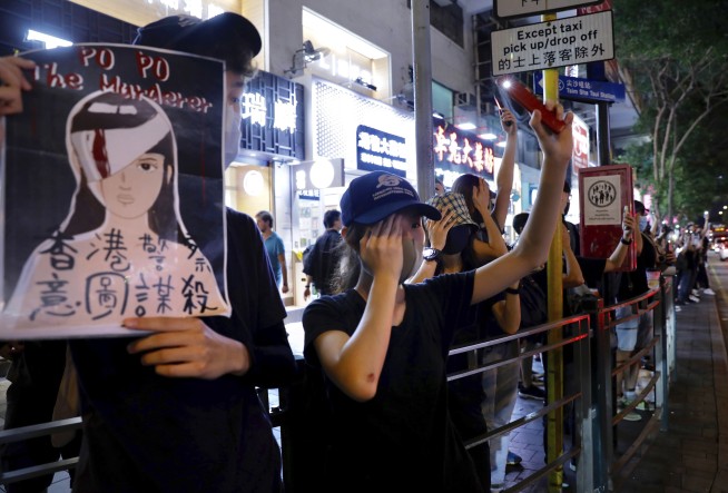 Hong Kong protesters form human chains to call for democracy