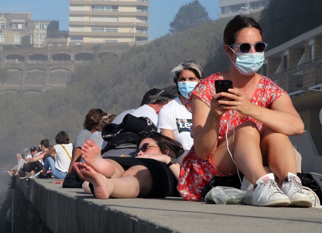 The Latest: Trump adviser apologizes for RT interview