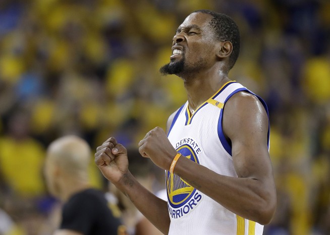 Kevin Durant, Stephen Curry lead Warriors to NBA title