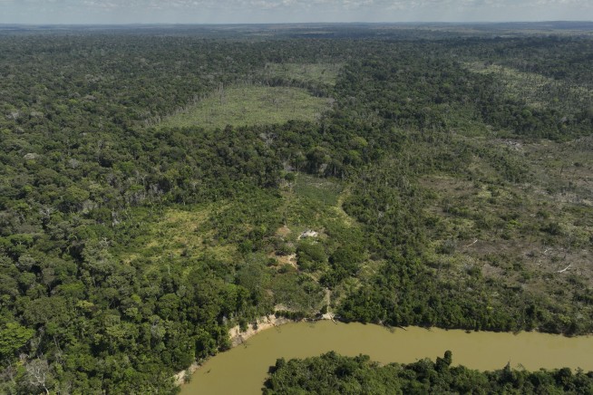 From the Amazon rainforest, Biden declares nobody can reverse US progress on clean energy