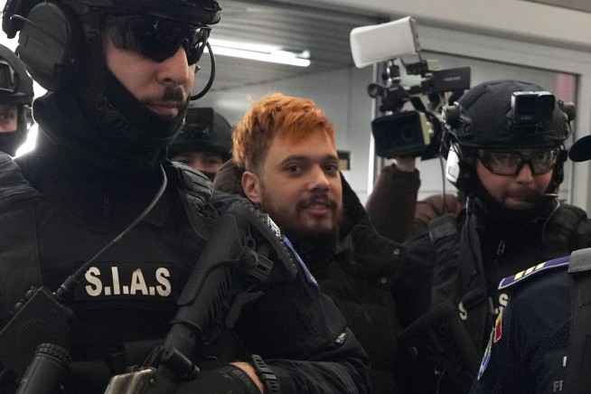 French fugitive 'The Fly' is extradited to France after his arrest in Romania