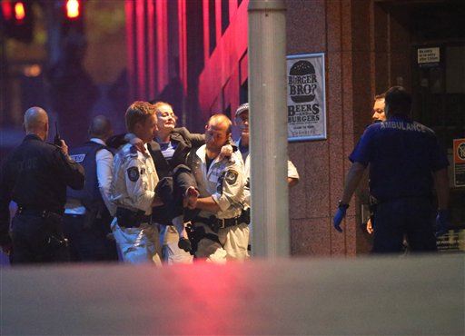 Gunfire as Sydney Cafe Stormed