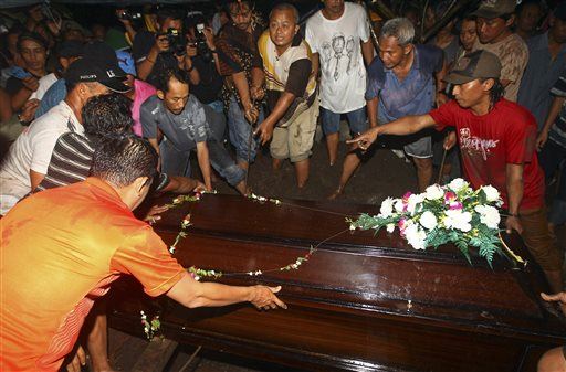 1st AirAsia Crash Victim IDed, Buried