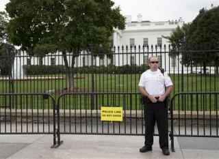 Man Tries to Scale White House Barrier