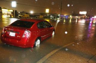 Floods Roll Through Texas, Okla., Kill Firefighter