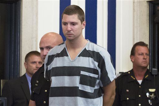 Applause as $1M Bond Set for Cop Charged With Murder
