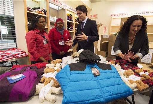 Canada PM Greets 1st Planeload of Refugees