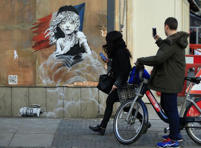 Banksy's Newest Target: Tear Gas Used on Refugees