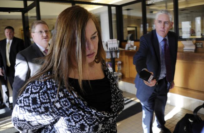 Widow of Cop Who Staged Suicide Indicted