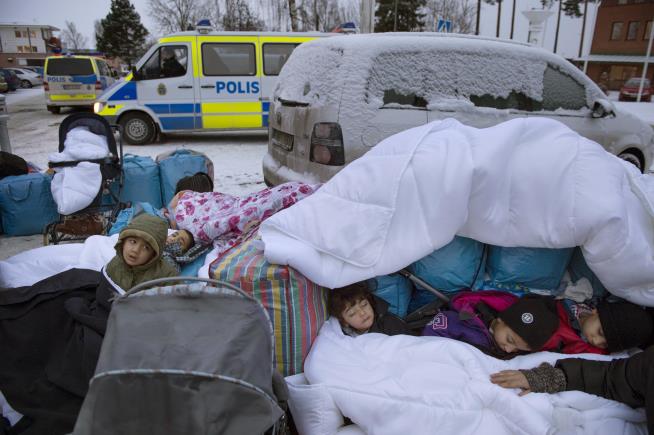 Masked Men Call for Attacks on Refugee Children in Sweden