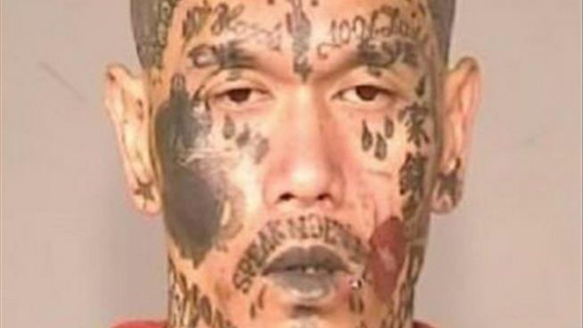 Man Buried Under Face Tattoos Faces Gun, Drug Charges