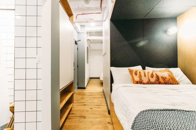 These NYC Apartments Offer Little Privacy, Free Beer