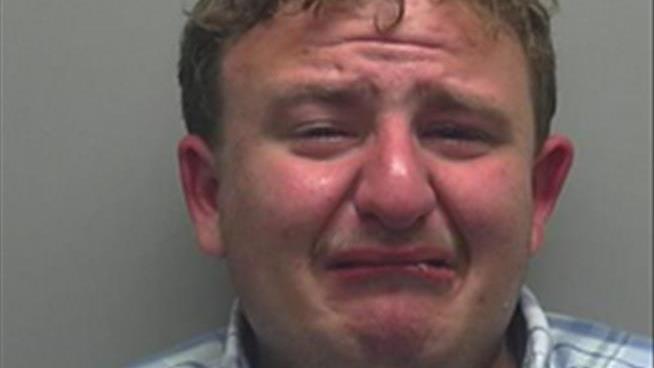 Sex Assault Charge Leads to Sobbing Mugshot
