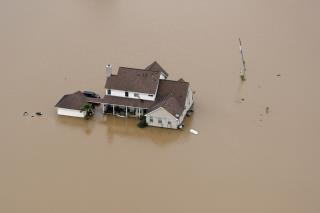Water-Filled Dam Saves Home During Texas Flood
