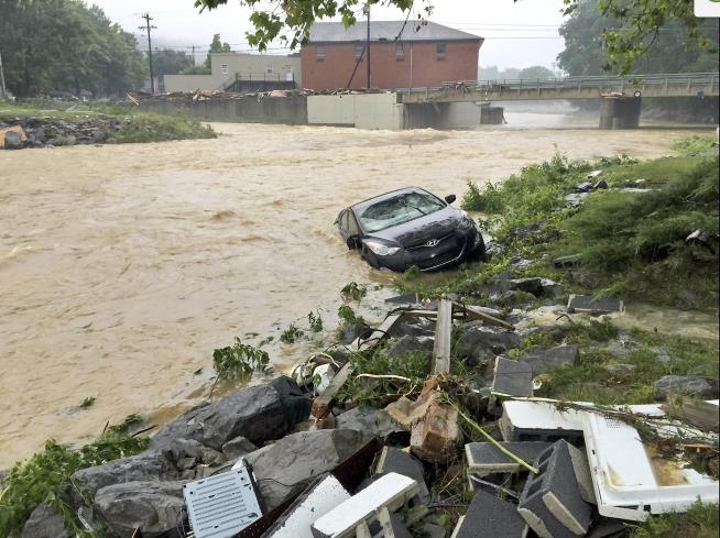 Flooding Kills 18 in West Virginia