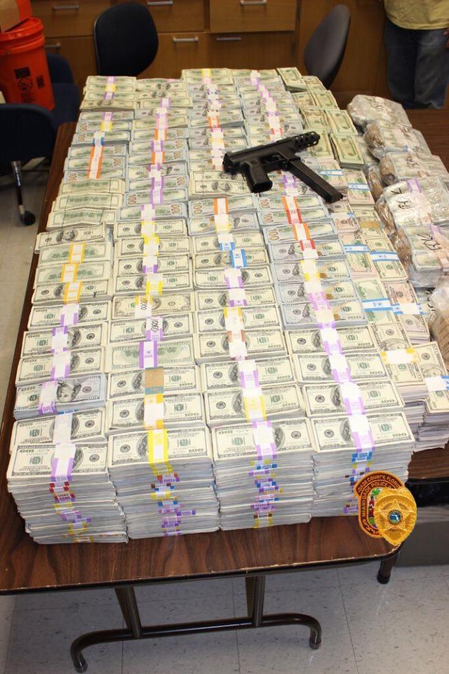 Cops Find $24M Stashed in Suspect's Wall