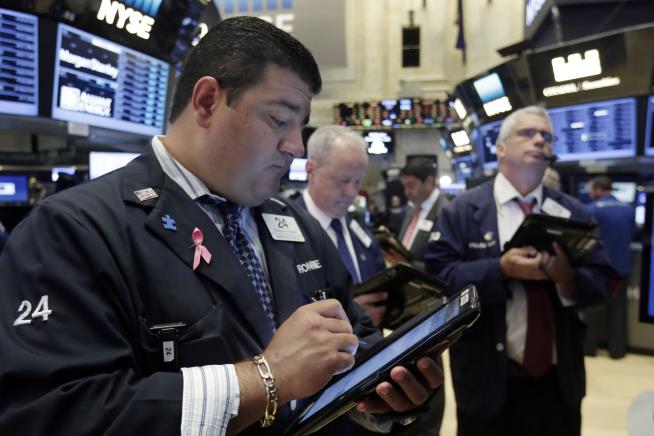 Dow Closes at Record High
