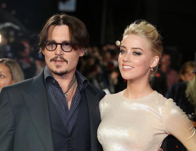 Johnny Depp, Amber Heard Settle Divorce