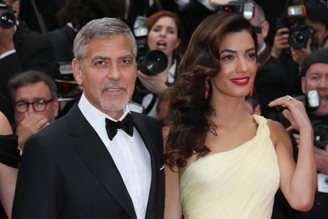 Amal Clooney Aiding Ex-ISIS Captive, With George's Blessing