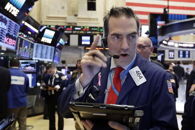 Dow Ends Day Up 75