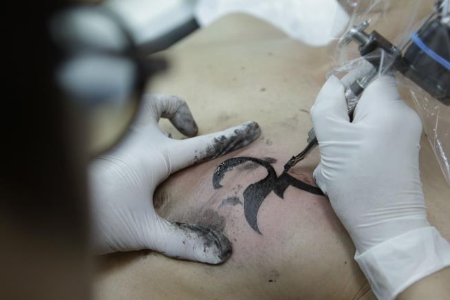 Artist Gets Strangers' Secrets Inked, Takes Them to His Grave