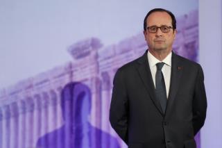 French President Pardons Woman Who Killed Her Husband