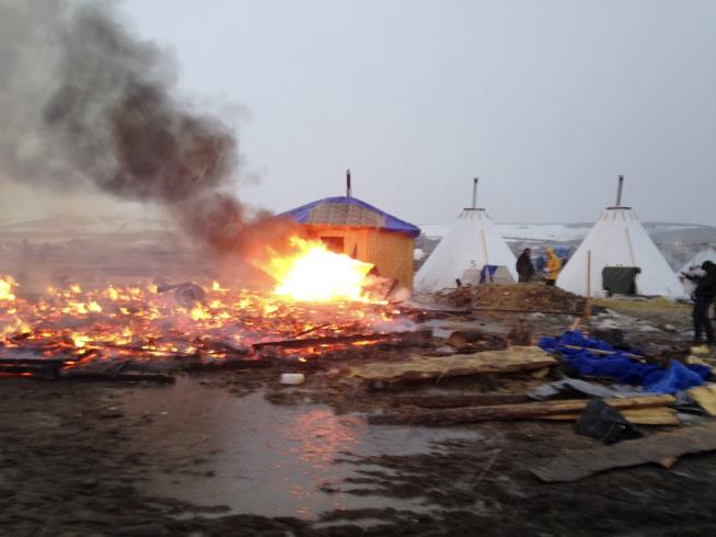 Fire, Prayer Mark End of Pipeline Protesters' Camp