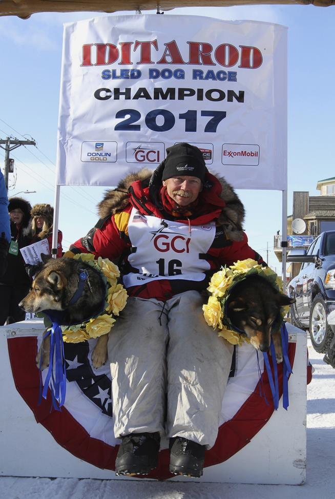 Veteran Musher Becomes Oldest, Fastest to Win Iditarod