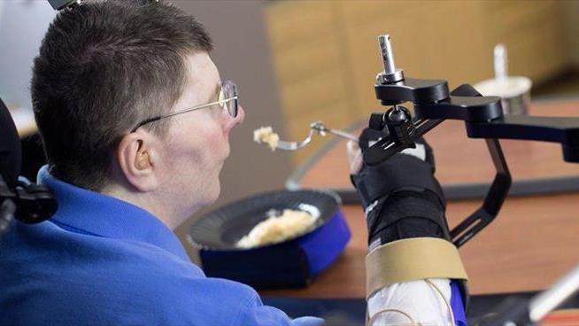Paralyzed Man Able to Feed Himself Again