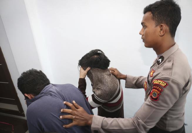 Indonesia Court Sentences Gay Couple to 85 Lashes