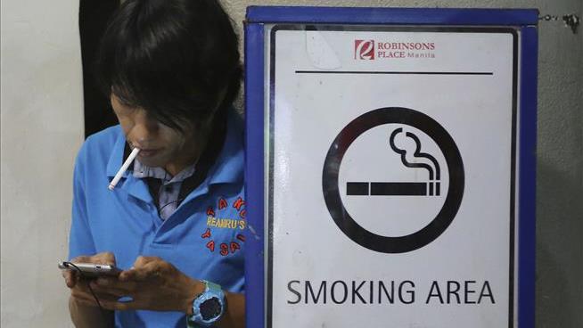 Filipino Strongman's New Target: Smokers