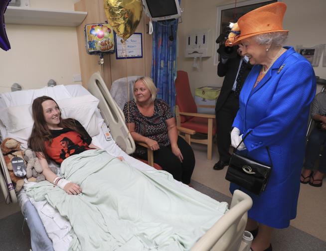 Bright Moment for Victims: a Visit From the Queen