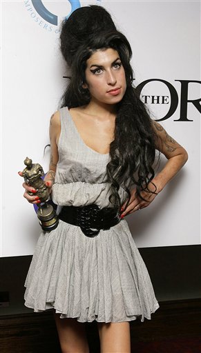 Winehouse Hospitalized After Fainting