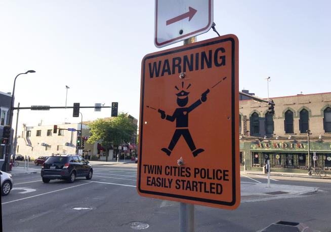Fake Street Signs Mock Minneapolis Police