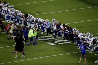 Cowboys, Owner Take a Knee Before Anthem
