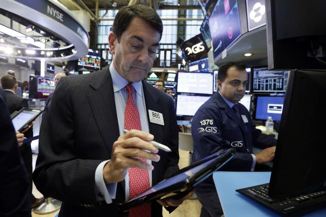 Stocks Close at Record Highs