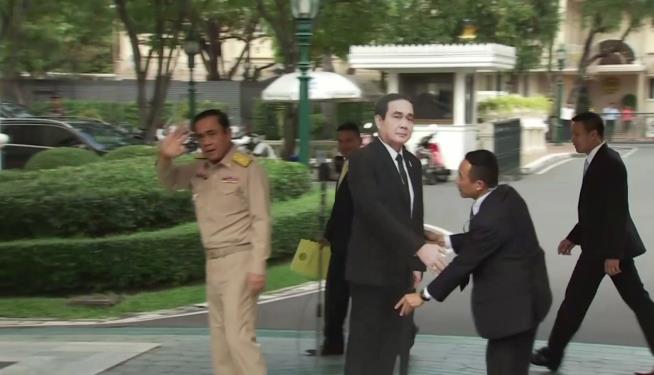 Thai PM and His Cardboard Replica Hold Press Conference