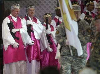 With Bullet Crowns and AR-15s, Church Ceremony Riles Town