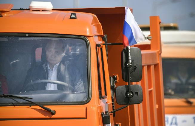 Why Putin Got Behind the Wheel of a Big Orange Truck