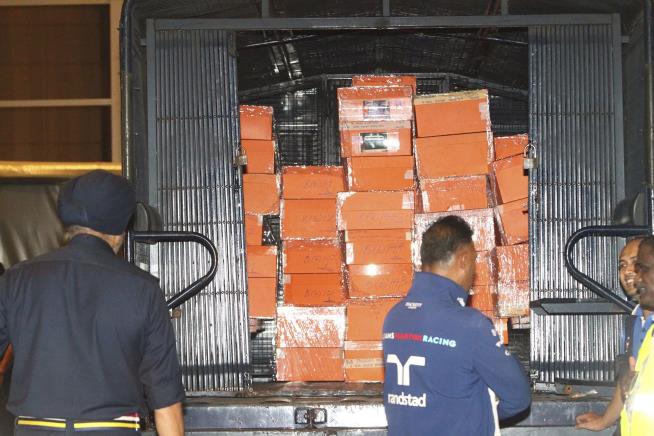 Cops Take 284 Boxes of Designer Handbags From Ex-PM