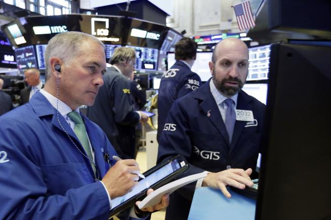 Stocks Close Slightly Higher