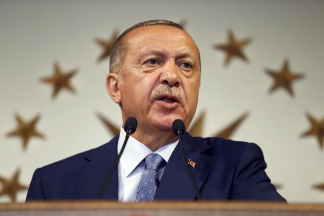 Turkey's Erdogan Re-Elected as More Powerful President