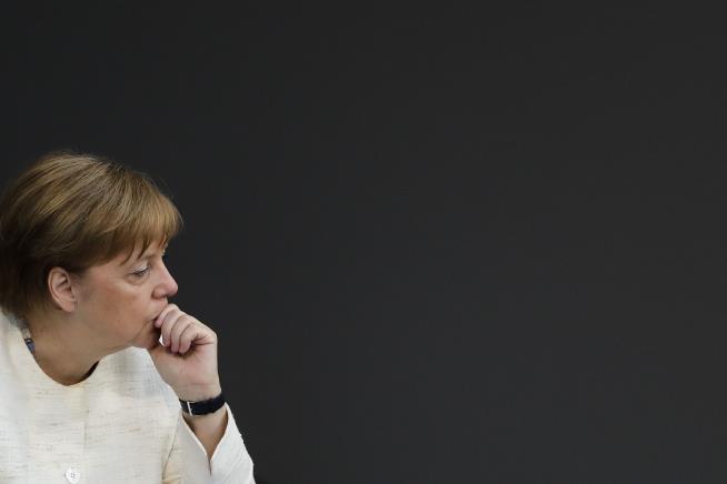 Merkel Survives, With a Huge Concession