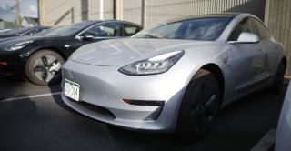 Why Are Hundreds of Teslas Parked in Spots Around the US?