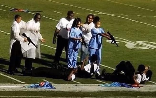 Band Halftime Show Depicts Cops at Gunpoint, Stirs Anger