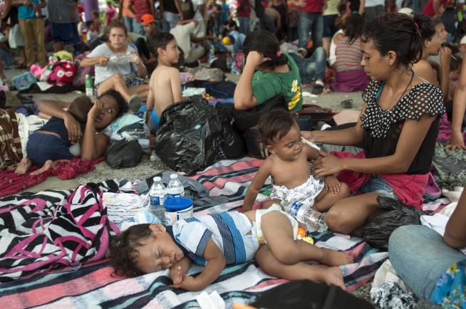Migrant Caravan Re-Forms in Mexico, Marches Northward