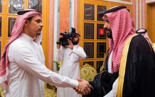 Saudi Prince's Day: A Jarring Handshake, Standing Ovation